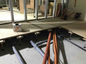 東京都豊島区のクリニックにて、新装工事に伴う置床工事を行いました。（乾式二重床）【秀和建工】